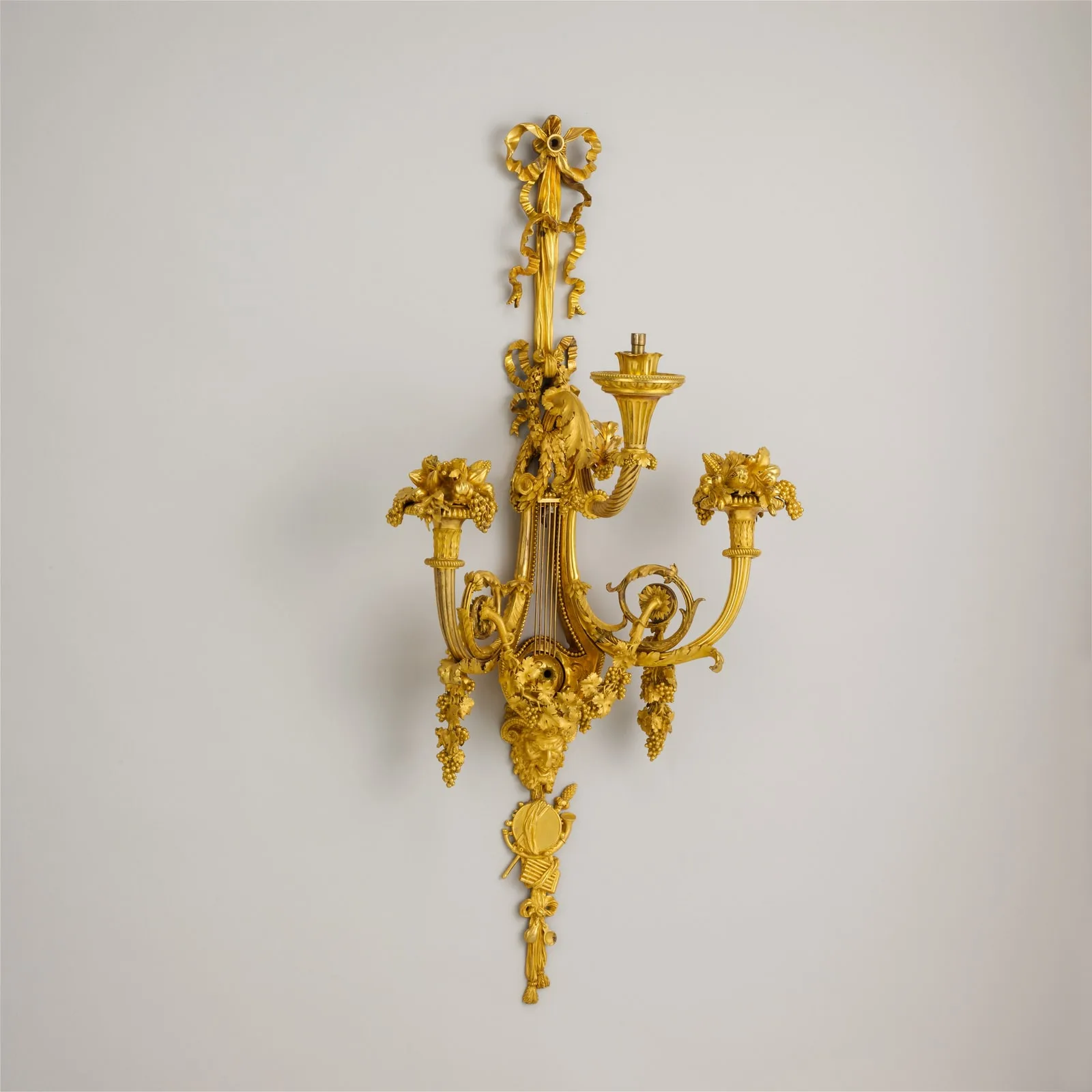 Set of four three-light sconces (bras de lumière)