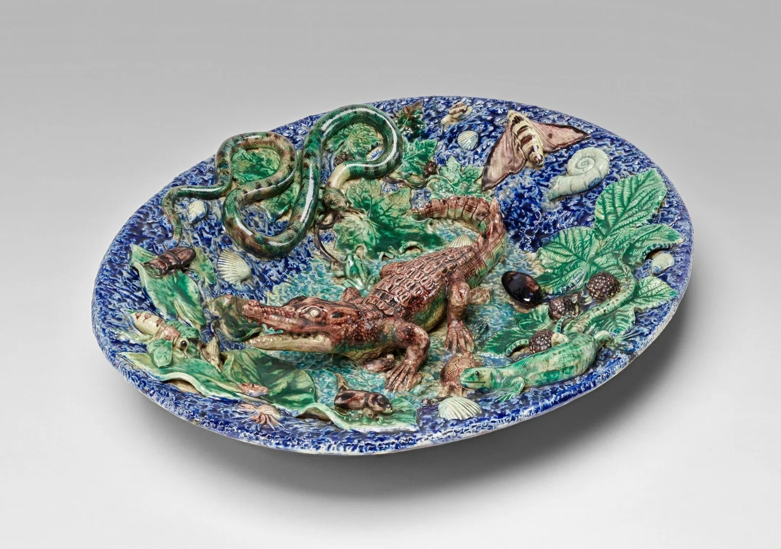 Rustic Plate with Crocodile, Snake, and Lizard