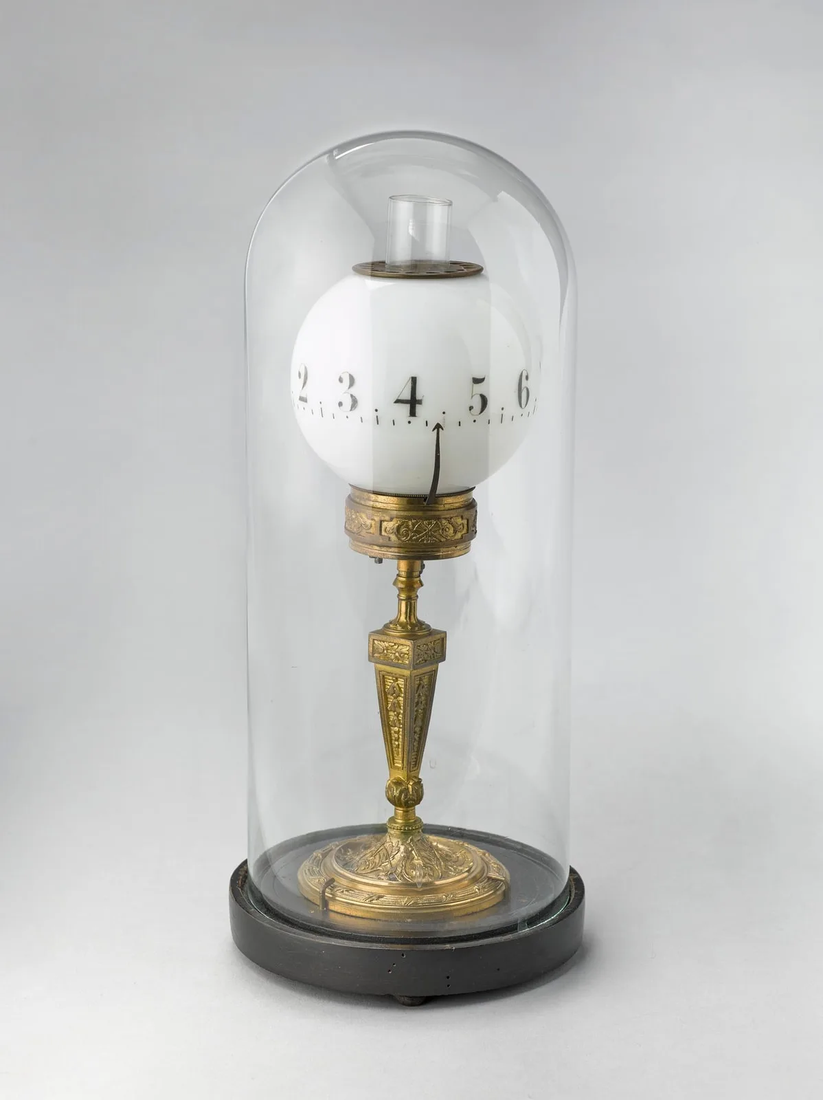 Pendule veilleuse, lampe à huile