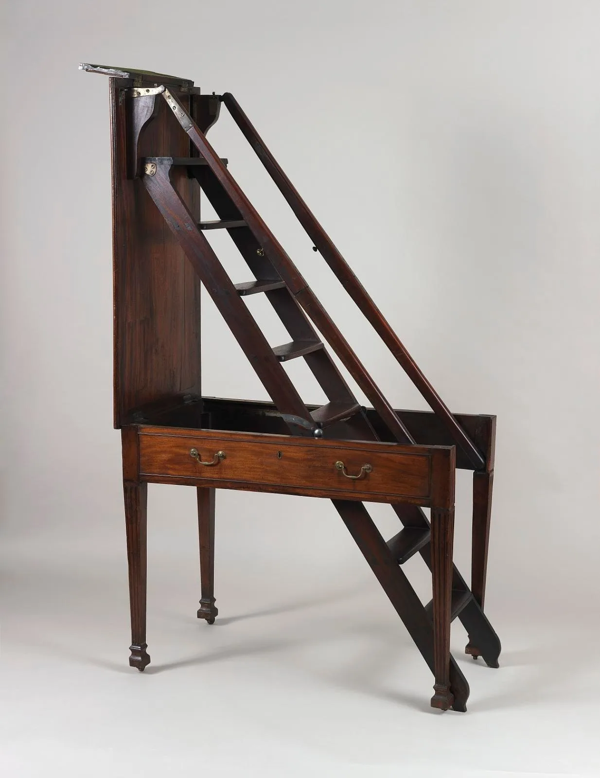 Metamorphic library table-steps